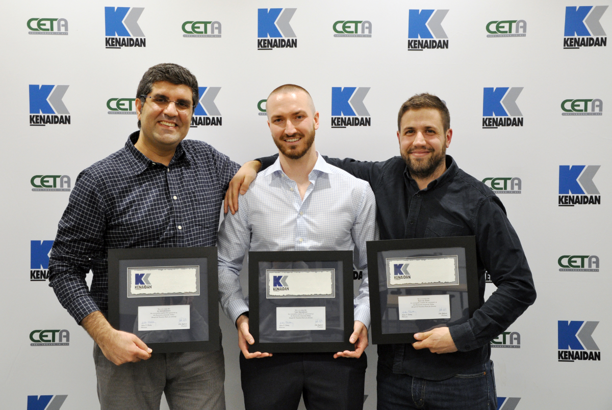 three Kenaidan employees receiving awards