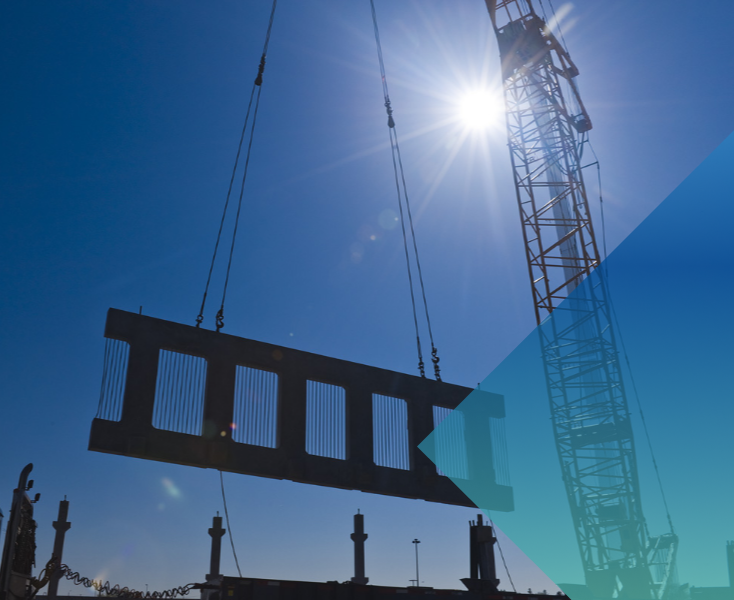 a construction crane lifting a large object