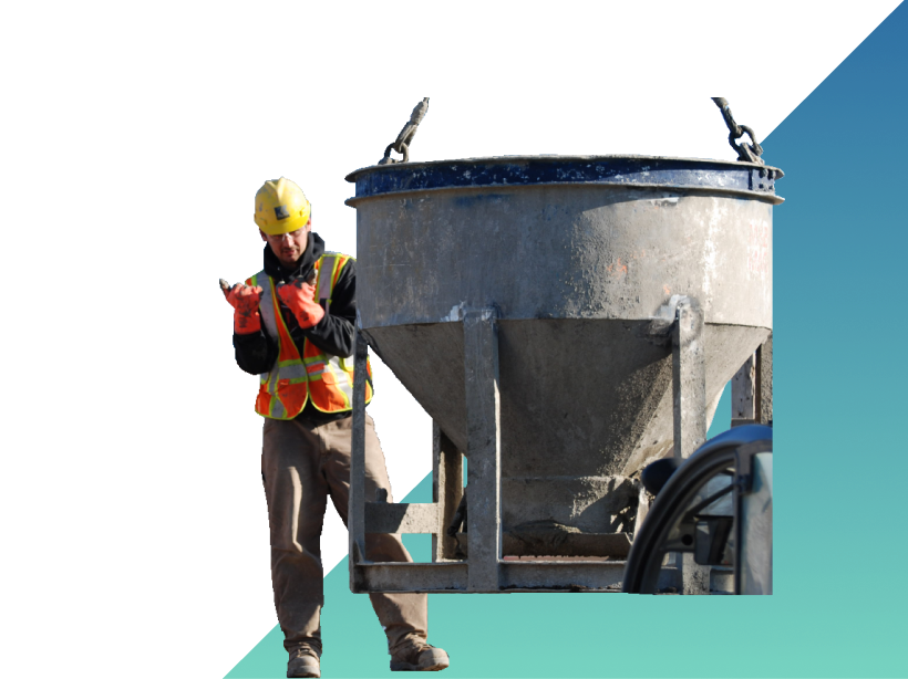 construction worker guiding a cement hopper